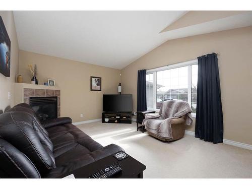 108 Swanson Crescent, Fort Mcmurray, AB - Indoor Photo Showing Living Room With Fireplace