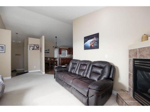 108 Swanson Crescent, Fort Mcmurray, AB - Indoor Photo Showing Living Room With Fireplace