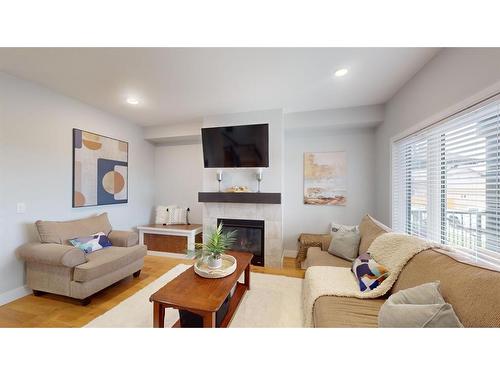 836 Athabasca Avenue, Fort Mcmurray, AB - Indoor Photo Showing Living Room With Fireplace