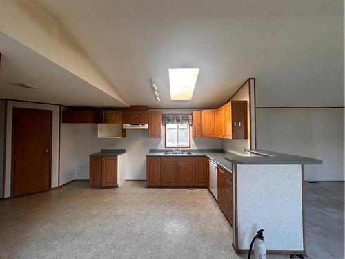 137 Mitchell Drive Ne, Fort Mcmurray, AB - Indoor Photo Showing Kitchen With Double Sink