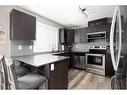 105-401 Athabasca Avenue, Fort Mcmurray, AB  - Indoor Photo Showing Kitchen With Stainless Steel Kitchen With Upgraded Kitchen 