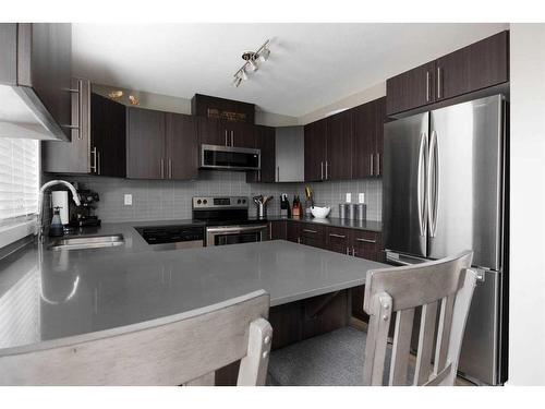 105-401 Athabasca Avenue, Fort Mcmurray, AB - Indoor Photo Showing Kitchen With Stainless Steel Kitchen With Upgraded Kitchen