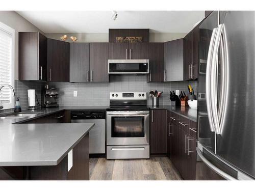 105-401 Athabasca Avenue, Fort Mcmurray, AB - Indoor Photo Showing Kitchen With Stainless Steel Kitchen With Upgraded Kitchen