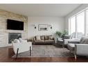 133 Gravelstone Way, Fort Mcmurray, AB  - Indoor Photo Showing Living Room With Fireplace 