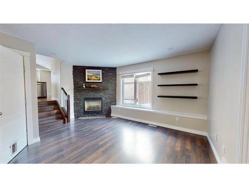 273 Rainbow Creek Drive, Fort Mcmurray, AB - Indoor Photo Showing Living Room With Fireplace