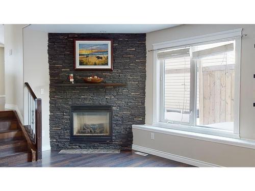 273 Rainbow Creek Drive, Fort Mcmurray, AB - Indoor Photo Showing Living Room With Fireplace