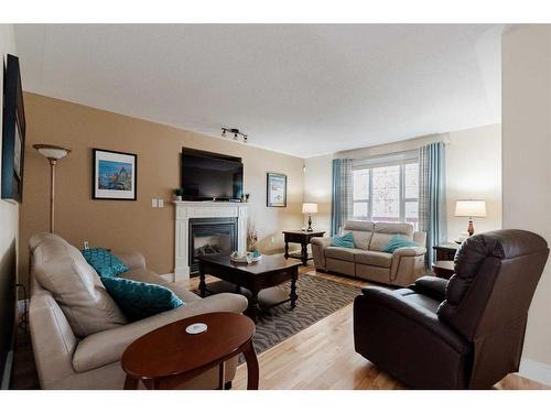 228 Coyote Crescent, Fort Mcmurray, AB - Indoor Photo Showing Living Room With Fireplace