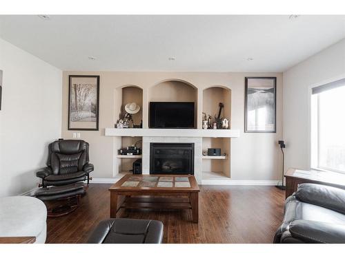 105 Crown Creek Lane, Fort Mcmurray, AB - Indoor Photo Showing Living Room With Fireplace