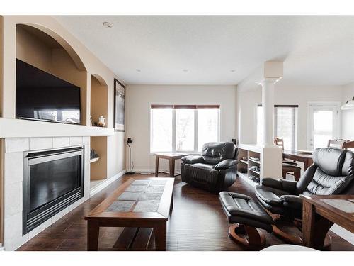 105 Crown Creek Lane, Fort Mcmurray, AB - Indoor Photo Showing Living Room With Fireplace