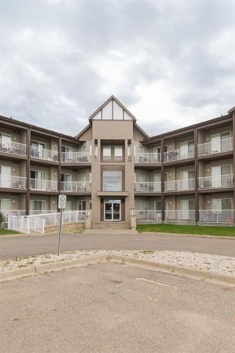 110-290 Plamondon Drive, Fort Mcmurray, AB - Outdoor With Balcony With Facade