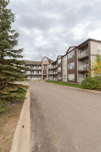 110-290 Plamondon Drive, Fort Mcmurray, AB - Outdoor With Balcony With Facade