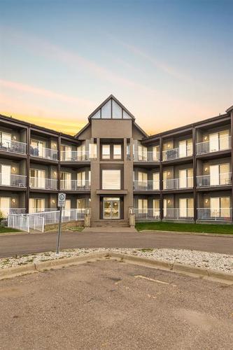 110-290 Plamondon Drive, Fort Mcmurray, AB - Outdoor With Balcony With Facade