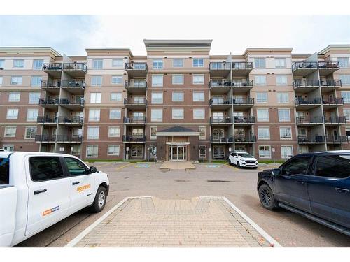 216-136A Sandpiper Road, Fort Mcmurray, AB - Outdoor With Balcony With Facade