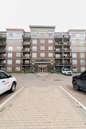 216-136A Sandpiper Road, Fort Mcmurray, AB - Outdoor With Balcony With Facade