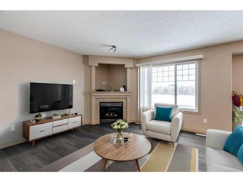 346 Grosbeak Way, Fort Mcmurray, AB - Indoor Photo Showing Living Room With Fireplace