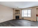 346 Grosbeak Way, Fort Mcmurray, AB  - Indoor Photo Showing Living Room With Fireplace 