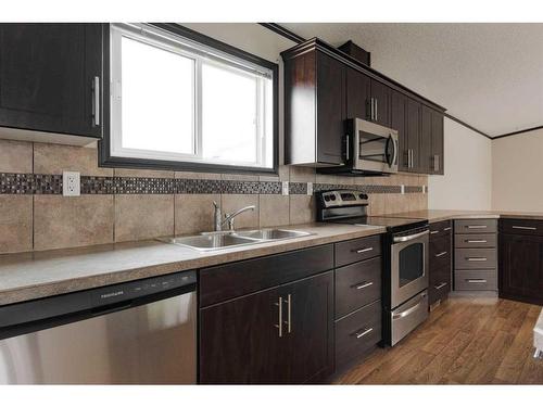 321 Grey Crescent, Fort Mcmurray, AB - Indoor Photo Showing Kitchen With Stainless Steel Kitchen With Double Sink