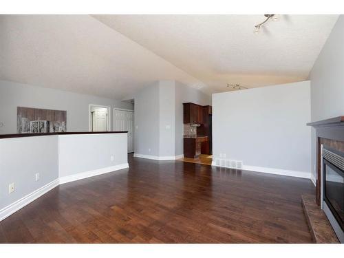 252 Crown Creek Lane, Fort Mcmurray, AB - Indoor Photo Showing Living Room With Fireplace