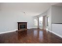 252 Crown Creek Lane, Fort Mcmurray, AB  - Indoor Photo Showing Living Room With Fireplace 