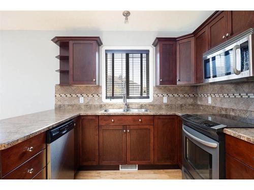 252 Crown Creek Lane, Fort Mcmurray, AB - Indoor Photo Showing Kitchen With Stainless Steel Kitchen With Double Sink