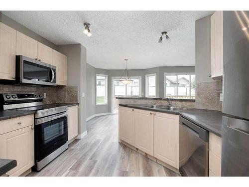 164 Cinnamon Street, Fort Mcmurray, AB - Indoor Photo Showing Kitchen With Double Sink