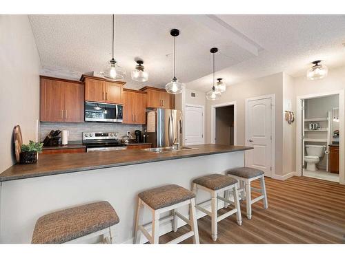 3106-135C Sandpiper Road, Fort Mcmurray, AB - Indoor Photo Showing Kitchen With Upgraded Kitchen