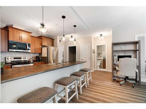 3106-135C Sandpiper Road, Fort Mcmurray, AB - Indoor Photo Showing Kitchen With Upgraded Kitchen