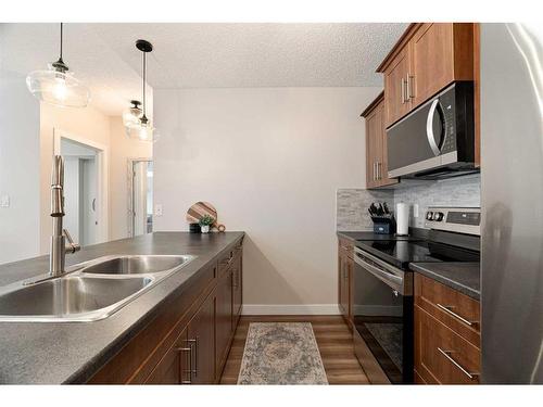 3106-135C Sandpiper Road, Fort Mcmurray, AB - Indoor Photo Showing Kitchen With Double Sink