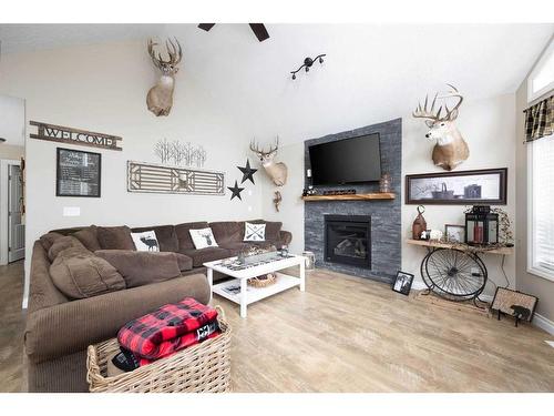 613 Lakeview Road, Rural Athabasca County, AB - Indoor Photo Showing Living Room With Fireplace