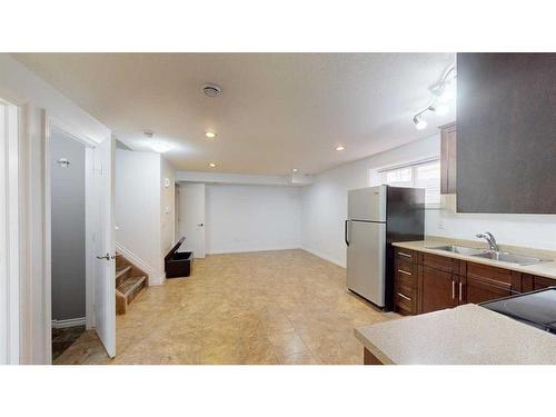 141 Coniker Crescent, Fort Mcmurray, AB - Indoor Photo Showing Kitchen With Double Sink