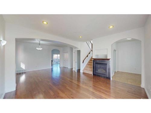 141 Coniker Crescent, Fort Mcmurray, AB - Indoor Photo Showing Living Room With Fireplace