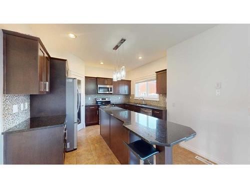 141 Coniker Crescent, Fort Mcmurray, AB - Indoor Photo Showing Kitchen