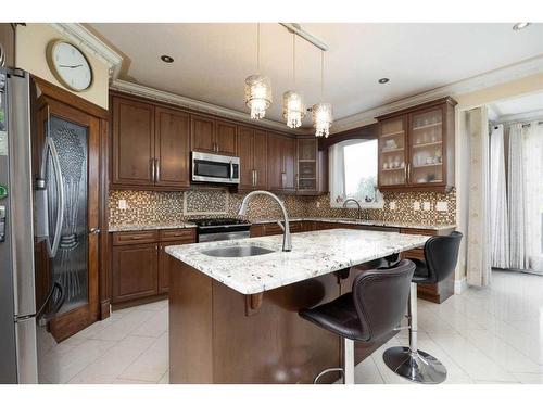 415 Fireweed Crescent, Fort Mcmurray, AB - Indoor Photo Showing Kitchen With Upgraded Kitchen