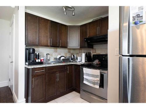 415 Fireweed Crescent, Fort Mcmurray, AB - Indoor Photo Showing Kitchen