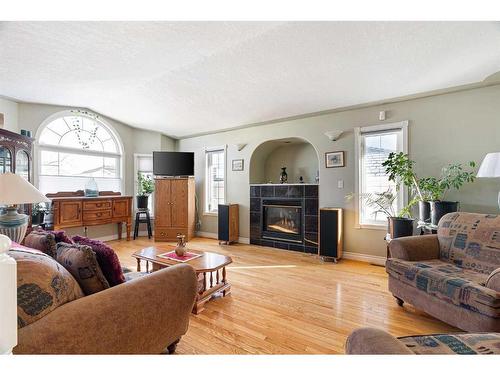 312 Burton Place, Fort Mcmurray, AB - Indoor Photo Showing Living Room With Fireplace