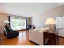 239 Cornwall Drive, Fort Mcmurray, AB  - Indoor Photo Showing Living Room 