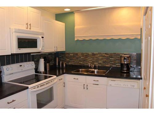 145 Rainbow Creek Drive, Fort Mcmurray, AB - Indoor Photo Showing Kitchen With Double Sink