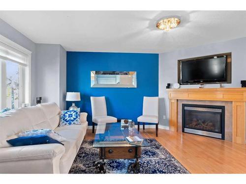 145 Rainbow Creek Drive, Fort Mcmurray, AB - Indoor Photo Showing Living Room With Fireplace