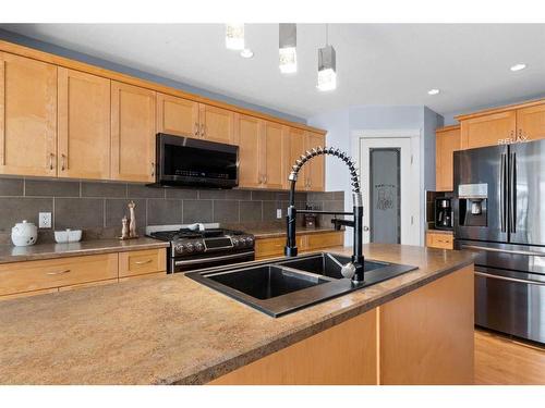 145 Rainbow Creek Drive, Fort Mcmurray, AB - Indoor Photo Showing Kitchen With Double Sink