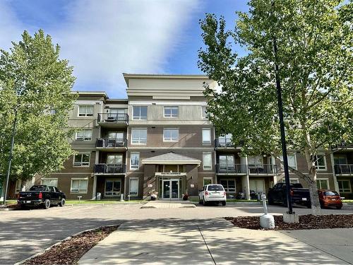 1315-135A Sandpiper Road, Fort Mcmurray, AB - Outdoor With Balcony With Facade