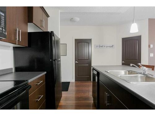 1315-135A Sandpiper Road, Fort Mcmurray, AB - Indoor Photo Showing Kitchen With Double Sink