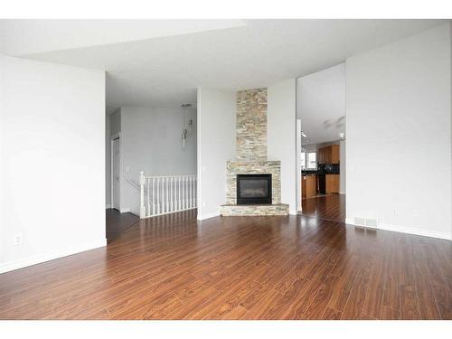 104 Pinto Place, Fort Mcmurray, AB - Indoor Photo Showing Living Room With Fireplace