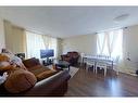 500-11721 Macdonald Drive, Fort Mcmurray, AB  - Indoor Photo Showing Living Room 