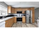 154 Grant Way, Fort Mcmurray, AB  - Indoor Photo Showing Kitchen With Double Sink 