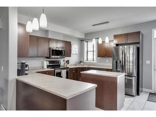 269 Grosbeak Way, Fort Mcmurray, AB - Indoor Photo Showing Kitchen With Stainless Steel Kitchen With Double Sink