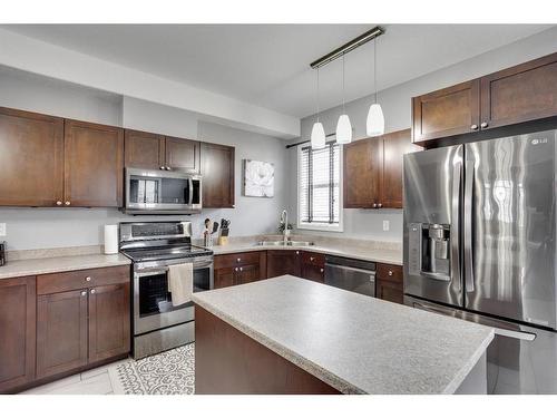 269 Grosbeak Way, Fort Mcmurray, AB - Indoor Photo Showing Kitchen With Stainless Steel Kitchen With Double Sink