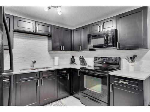 269 Grosbeak Way, Fort Mcmurray, AB - Indoor Photo Showing Kitchen With Double Sink