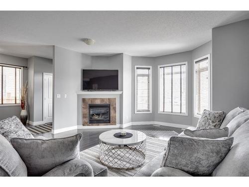 269 Grosbeak Way, Fort Mcmurray, AB - Indoor Photo Showing Living Room With Fireplace