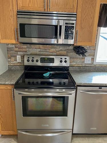 128 Sumac Crescent, Fort Mcmurray, AB - Indoor Photo Showing Kitchen