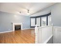 155 Peterson Lane, Fort Mcmurray, AB  - Indoor Photo Showing Living Room With Fireplace 